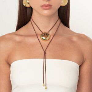 Eliou Lija gold necklace pendant with versatile suede leather handmade upcycled